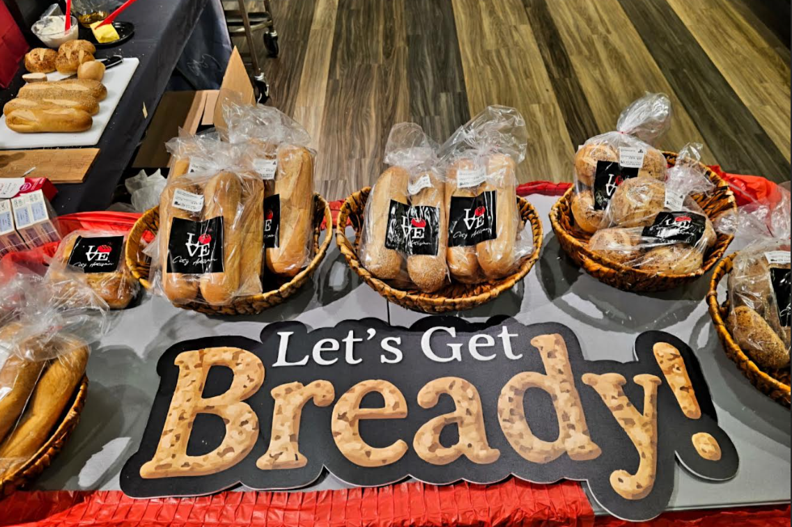 Love City Artisan breads in baskets with a Let's Get Bready! sign