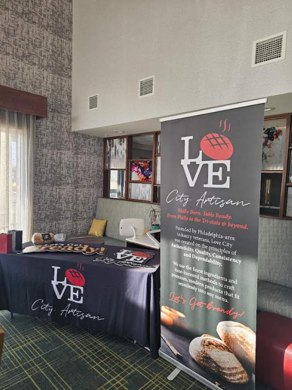 Love City Artisan booth display at Center City